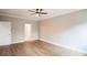 Bedroom with wood flooring and access to bathroom at 5422 Army Rd, Marshville, NC 28103