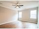 Spacious bedroom with hardwood floors and ceiling fan at 5422 Army Rd, Marshville, NC 28103