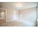 Well-lit bedroom with access to hallway at 5422 Army Rd, Marshville, NC 28103