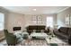 Spacious living room featuring a cozy fireplace and ample natural light at 5422 Army Rd, Marshville, NC 28103