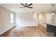 Spacious living room with hardwood floors and access to kitchen at 5422 Army Rd, Marshville, NC 28103