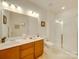 Double vanity bathroom with a large shower and plenty of counter space at 6029 Landry Ln, Indian Land, SC 29707