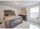 Bedroom with a large bed and a dresser at 6029 Landry Ln, Indian Land, SC 29707