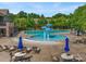 Community pool with mushroom water features and lounge chairs at 6029 Landry Ln, Indian Land, SC 29707