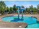 Community kiddie pool with mushroom water features and lounge chairs at 6029 Landry Ln, Indian Land, SC 29707