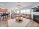Open living room with a sectional sofa, fireplace and hardwood floors at 6029 Landry Ln, Indian Land, SC 29707