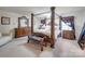 Elegant main bedroom with a four-poster bed and ample furniture at 6029 Landry Ln, Indian Land, SC 29707