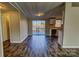 Dining area with wood-look floors and access to deck at 6415 Sherwood Ln, Denver, NC 28037