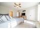Bright bedroom featuring a ceiling fan, neutral walls, and carpeted floors at 6835 Ingleside Dr, Sherrills Ford, NC 28673