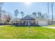 Charming single-story home featuring a front porch, well-manicured lawn, and attached one-car garage at 6835 Ingleside Dr, Sherrills Ford, NC 28673