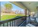 Cozy front porch with rocking chairs, providing a relaxing outdoor space to enjoy the surrounding landscape at 6835 Ingleside Dr, Sherrills Ford, NC 28673