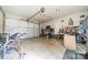 View of two car garage featuring work bench, storage, and overhead door at 6835 Ingleside Dr, Sherrills Ford, NC 28673