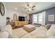Bright living room with a large sectional couch, entertainment center, and plenty of space for entertaining guests at 6835 Ingleside Dr, Sherrills Ford, NC 28673