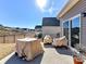 Small patio area with covered furniture and privacy fence at 7192 Indigo Way, Denver, NC 28037