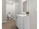 Clean bathroom featuring a white vanity and updated fixtures at 806 S Martin Luther King Ave, Salisbury, NC 28144