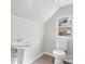 Clean bathroom with pedestal sink and toilet at 806 S Martin Luther King Ave, Salisbury, NC 28144
