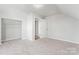 Bright bedroom with carpet and walk-in closet at 806 S Martin Luther King Ave, Salisbury, NC 28144