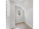 Small bedroom with sloped ceiling and a window at 806 S Martin Luther King Ave, Salisbury, NC 28144