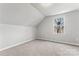 Simple bedroom with carpet and a window at 806 S Martin Luther King Ave, Salisbury, NC 28144