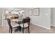 Charming dining area with a four-person table and kitchen views at 806 S Martin Luther King Ave, Salisbury, NC 28144