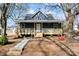 Charming renovated home with a welcoming front porch and landscaped yard at 806 S Martin Luther King Ave, Salisbury, NC 28144