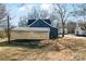 Rear view of house showcasing carport and yard at 806 S Martin Luther King Ave, Salisbury, NC 28144