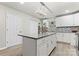 Modern kitchen with white cabinets, granite countertops and island at 806 S Martin Luther King Ave, Salisbury, NC 28144