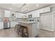 Modern kitchen with white cabinets, granite countertops and island at 806 S Martin Luther King Ave, Salisbury, NC 28144
