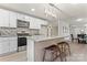 Modern kitchen with island, white cabinets and granite countertops at 806 S Martin Luther King Ave, Salisbury, NC 28144