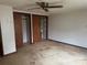 Bedroom with double closets and ceiling fan at 918 Old Lilesville Rd, Wadesboro, NC 28170