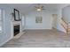 Living room with fireplace and hardwood floors at 10132 Baxter Caldwell Dr, Charlotte, NC 28213