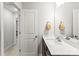 Bathroom featuring single vanity, framed mirror and tile flooring at 1201 Township Pkwy, Belmont, NC 28012