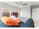 Bedroom featuring ceiling fan, dresser and natural light at 1201 Township Pkwy, Belmont, NC 28012