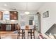 Eat-in breakfast nook with lots of light and wood table at 1201 Township Pkwy, Belmont, NC 28012