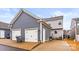 Detached two-car garage with a side entrance and ample parking space at 1201 Township Pkwy, Belmont, NC 28012