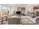 Sunlit living room featuring hardwood floors and ample natural light at 1201 Township Pkwy, Belmont, NC 28012