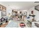 Spacious open-concept living area featuring hardwood floors, white walls, and an eat-in kitchen at 1201 Township Pkwy, Belmont, NC 28012