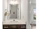 Clean powder room with modern fixtures and a dark wood vanity at 1201 Township Pkwy, Belmont, NC 28012