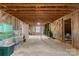 Unfinished attic space with exposed wooden beams, insulation, and room for storage or customization at 1335 E Marion St, Shelby, NC 28150