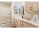 Neutral bathroom showcasing vanity with ample counter space, cabinets, and shower with sliding doors at 1335 E Marion St, Shelby, NC 28150