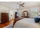 Spacious bedroom with hardwood floors, neutral walls, and natural light from the windows at 1335 E Marion St, Shelby, NC 28150