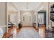 Elegant foyer with a large rug, hardwood floors, and an arched doorway at 1335 E Marion St, Shelby, NC 28150
