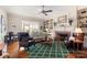 Spacious living room with fireplace, built-in shelving, and hardwood floors at 1335 E Marion St, Shelby, NC 28150