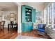 Living room featuring a unique built-in cabinet and comfortable seating at 1335 E Marion St, Shelby, NC 28150