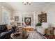 Living room view showcasing hardwood floors, detailed millwork, and seamless flow into the dining area at 1335 E Marion St, Shelby, NC 28150