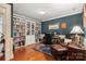 Charming office with hardwood floors, a built-in bookcase, and a leather chair at 1335 E Marion St, Shelby, NC 28150