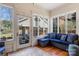 Sunroom with lots of natural light and comfortable seating area at 1335 E Marion St, Shelby, NC 28150
