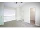 Spacious bedroom featuring neutral carpeting and an adjoining walk-in closet at 1748 Pergola Pl, Charlotte, NC 28213