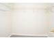 Walk-in closet with white wire shelving for optimal storage at 1748 Pergola Pl, Charlotte, NC 28213