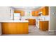 Bright kitchen features ample counter space and oak cabinetry at 1748 Pergola Pl, Charlotte, NC 28213